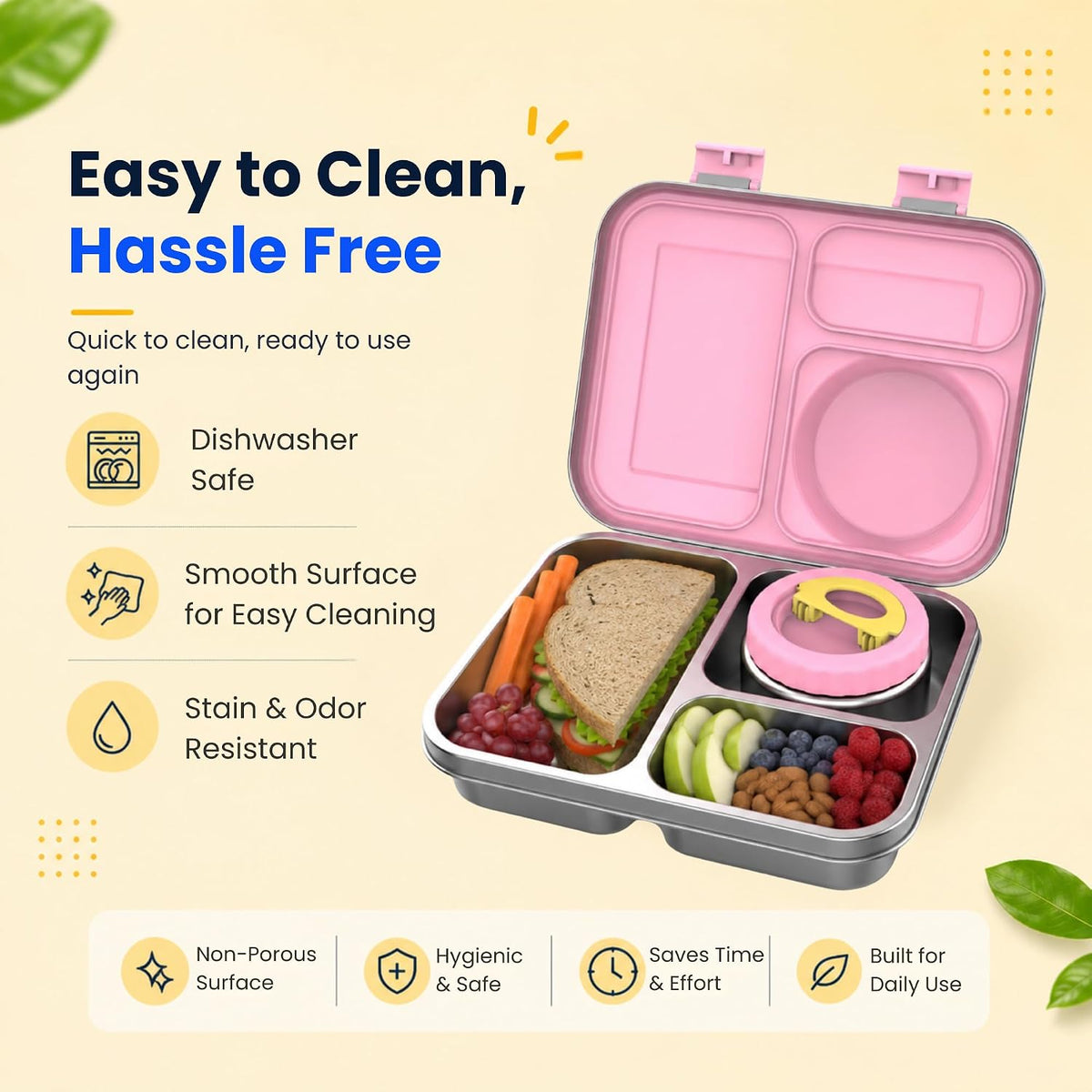 Easy to clean dishwasher safe pink bento lunch box packed with sandwich, fruit and snacks