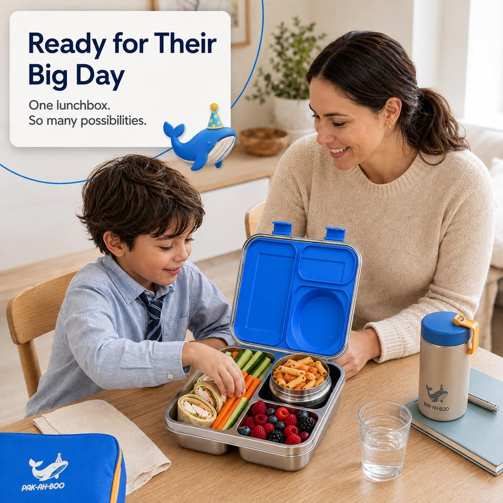 School boy with packed school lunch box – leakproof bento lunch box for kids